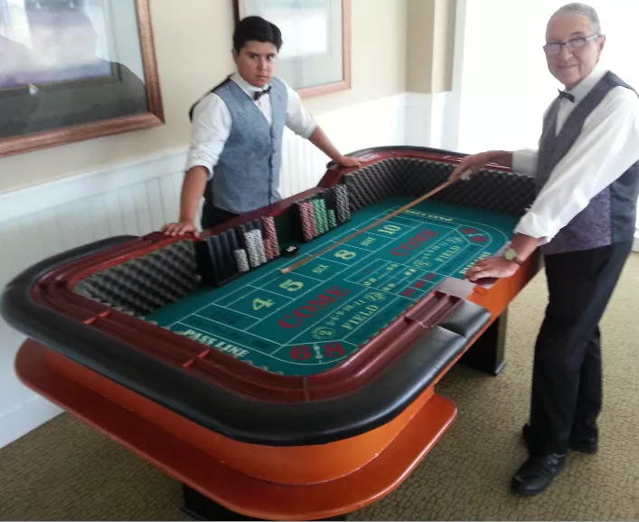 Craps Table Rentals dealers in action